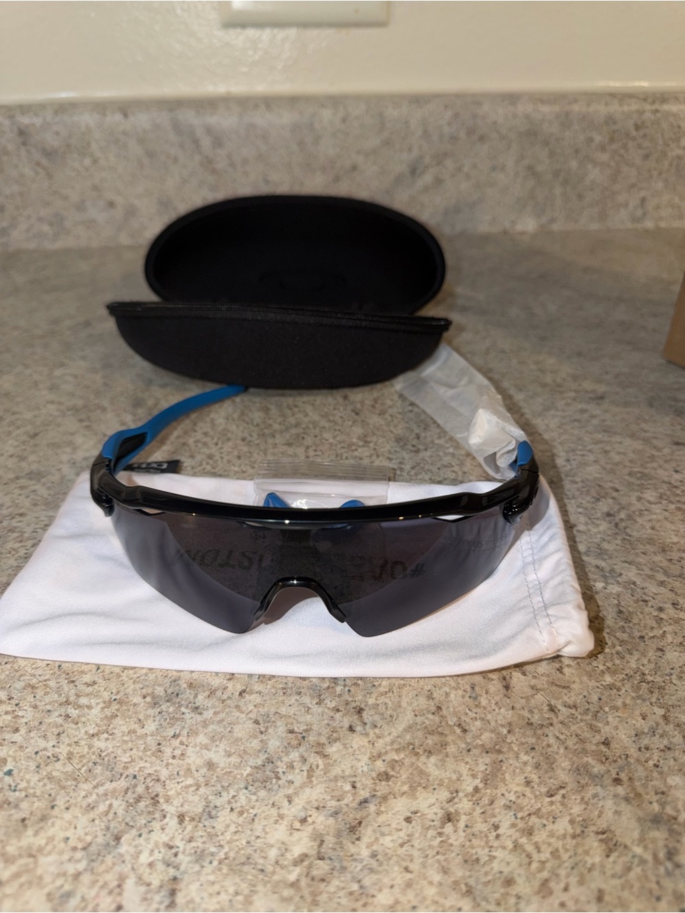 Oakley Black Shield Sunglasses with Blue Temples